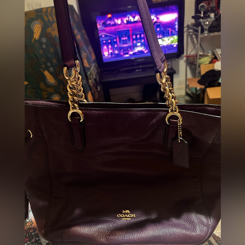 Used coach shoulder bag. Mint condition no scratches or stains. Great bag